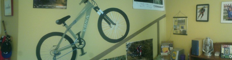 Panoramic view of  my room with my old bike on the wall and signed poster of Super T