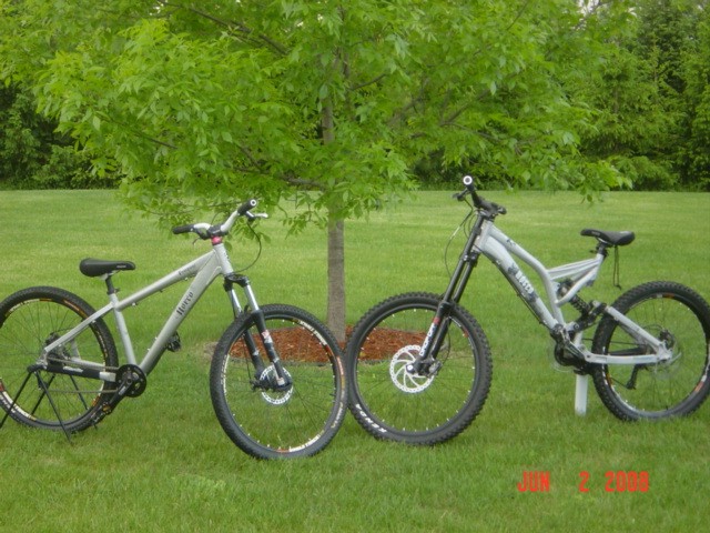 a pic of my rampage to the left. with DJ2 shimano deore cranks and hubs, single track rims, and K- rads Stick-E  and too the right is \ a pic of my norco shore 3/ 06/ model