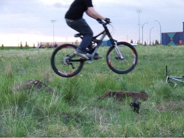 Hiting some really small dirt jumps
