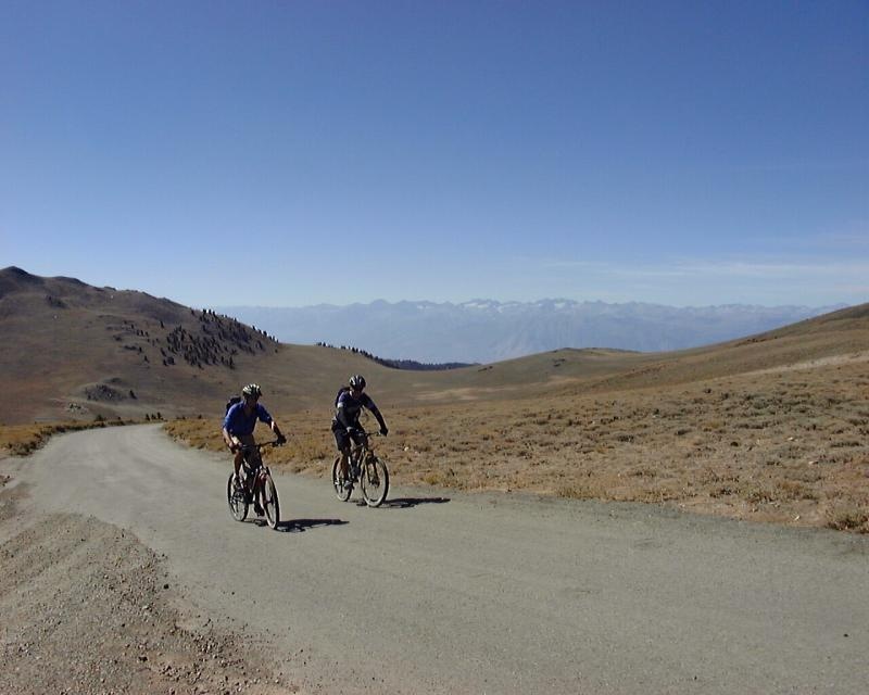 Steep grind at 3300m, Sierra Nevada in the background.