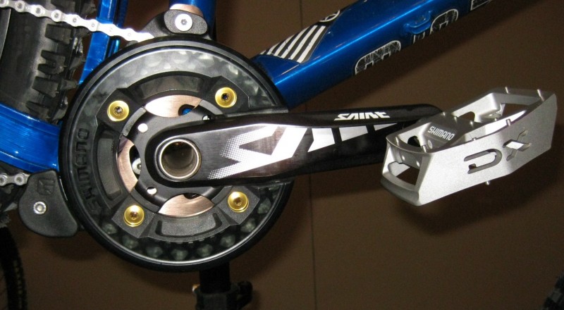 SAINT cranks with 36T ring and guide with DX platform pedals.