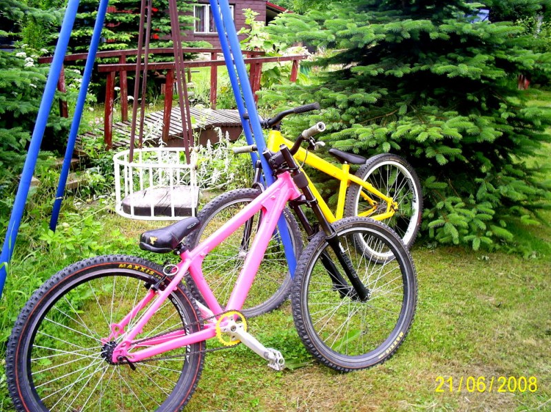 Pink bike and yelow bike