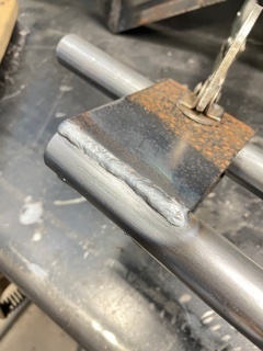 Practice welds for linkage fork