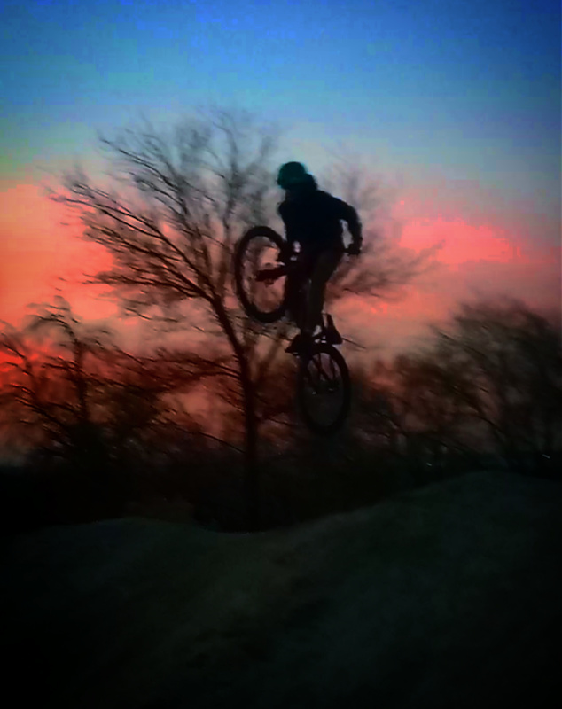 Doing a bar hump in the sunset.
