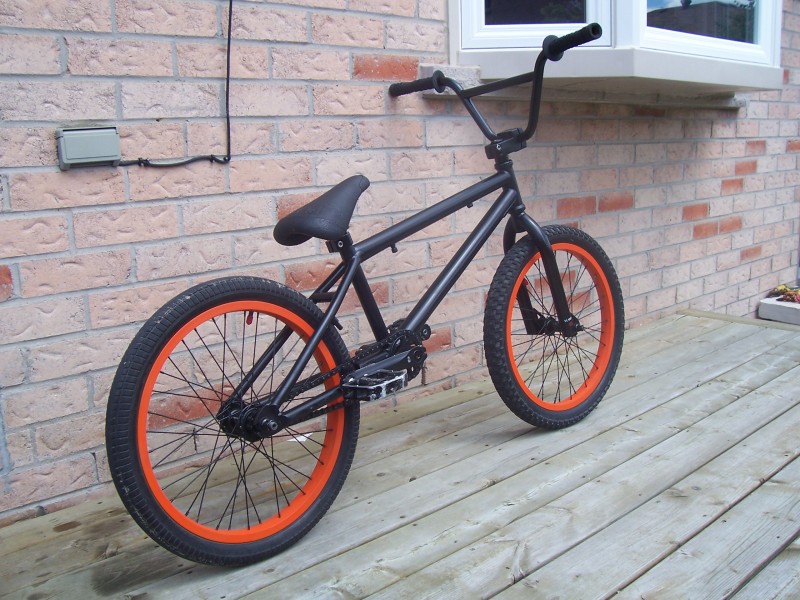 finished painting my bike. black on neon orange. Orange is brighter than in pics.