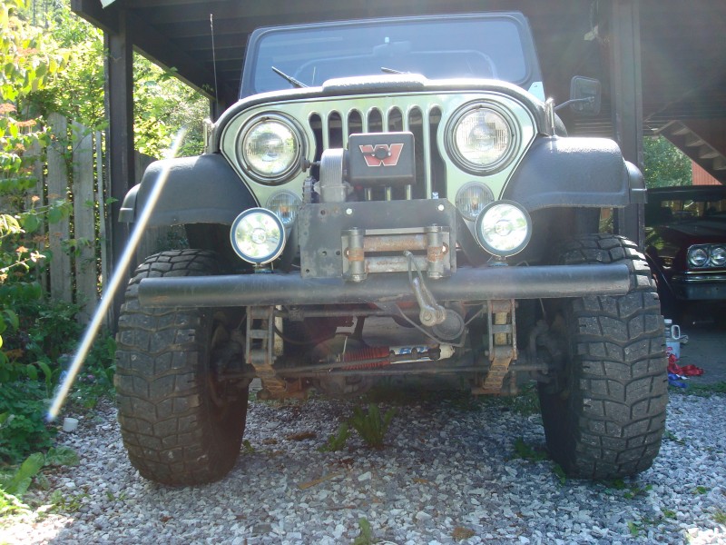 Best JEEP ever. 1983 CJ7, Rhino lined inside'n out, Custom Dash, 5 speed, Chevy 350 with well over 350 HP, MSD Ignition and 7" of lift with 35" tires. Straight pipe exaust (SO nice and loud). Hard'n Soft top and Bikini top, Hard'n Soft doors. 8000 LB warn winch. This thing is TALL narrow short Powerfull  Loud Awesome.