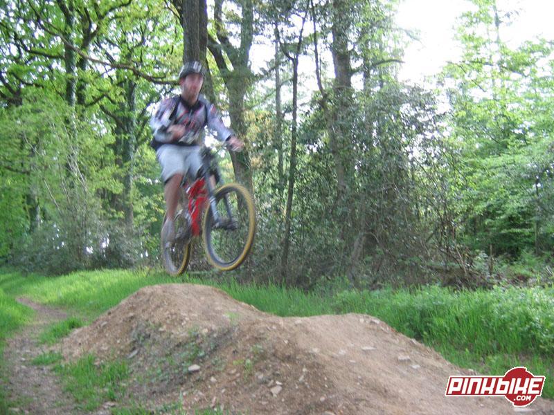 Me jumping the double at the top of our woods on my 2003 Scott High Octane FR.