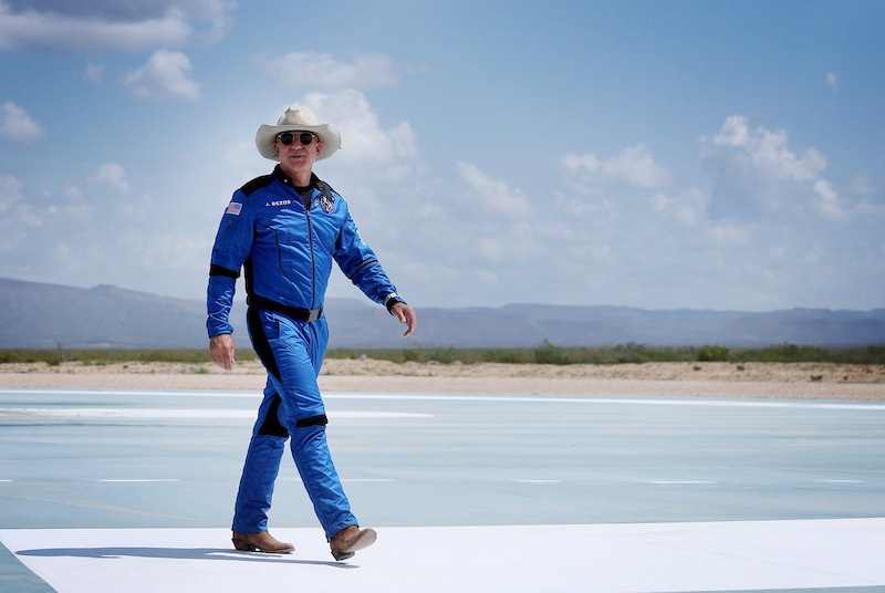 VAN HORN TEXAS - JULY 20 Jeff Bezos walks near Blue Origin s New Shepard after flying into space on July 20 2021 in Van Horn Texas. Mr. Bezos and the crew that flew with him were the first human spaceflight for the company. Photo by Joe Raedle Getty Images 