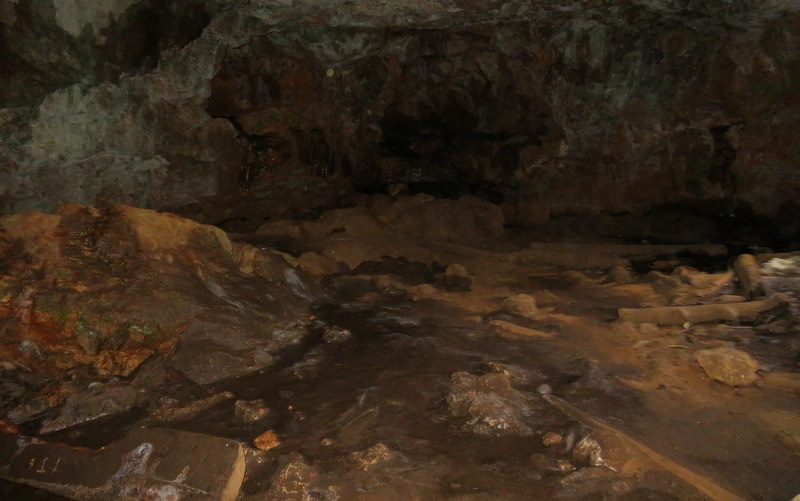 The Duck Creek Ice Cave is a small one-room limestone cave and portions of the cave floor have ice almost year-round.