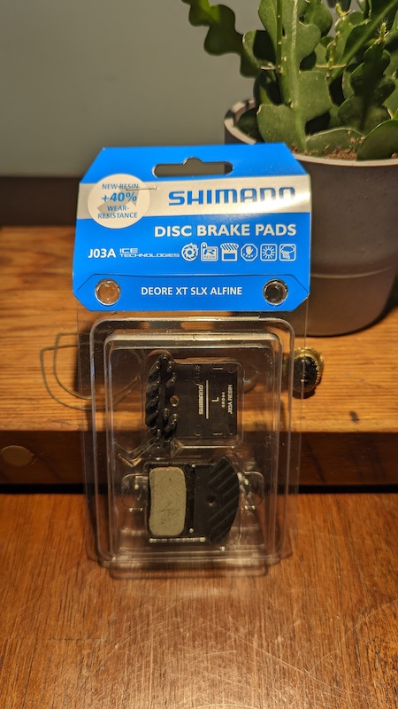 shimano xt brake pads fins