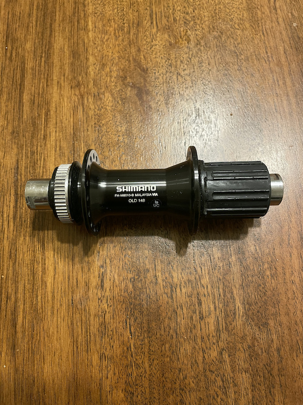 shimano xt rear hub service