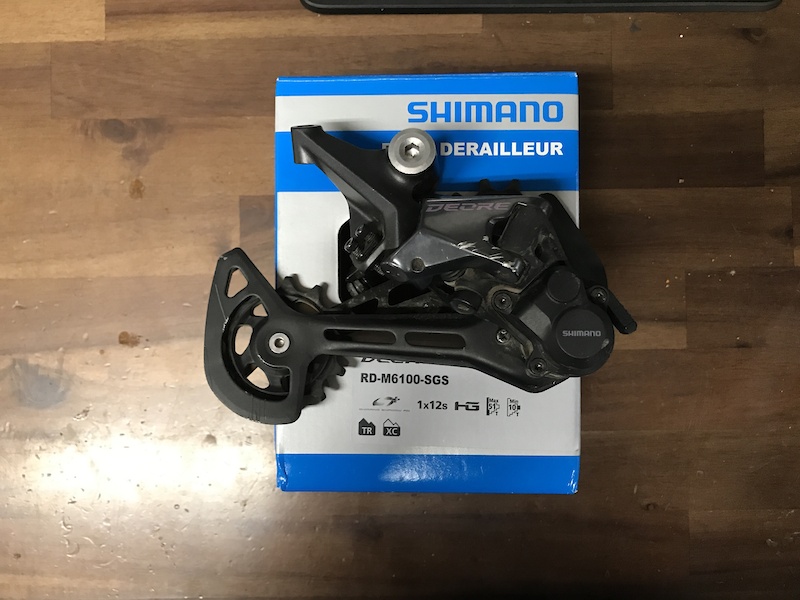 Dérailleur Arrière Shimano Deore RD-M6100-SGS – 12 Vitesses, Neuf (détail Boîte)