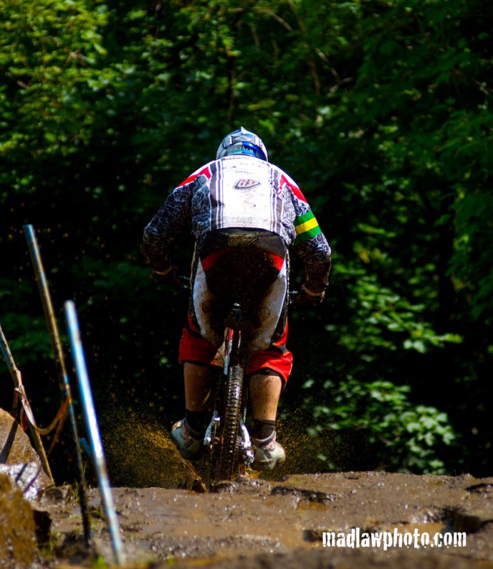 Nathan Rennie pinning it through the sloppy mud.
http://www.madlawphoto.com