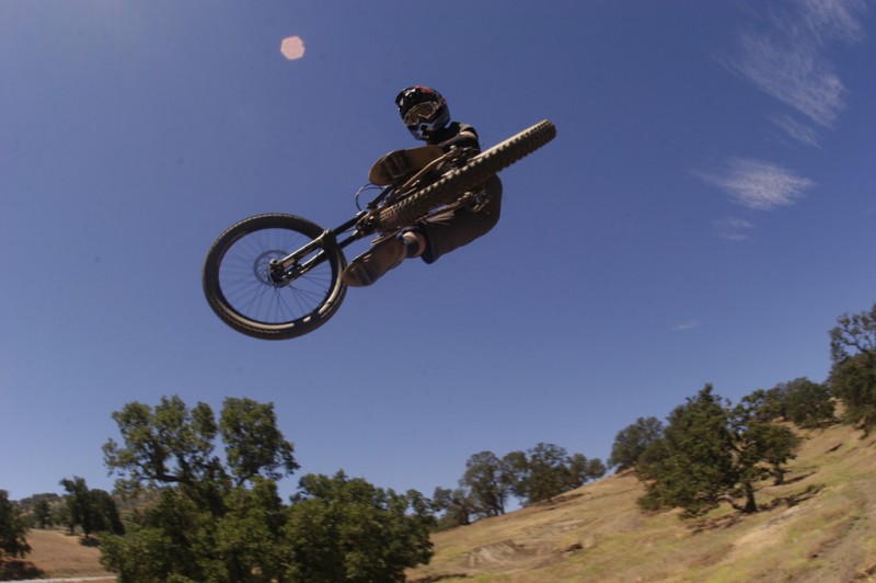 MTB Director Jeremy Witek whips out a good one over one of the hips at Woodward West slopestyle course