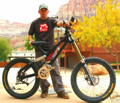 This is the beefiest bike you'll find out there...it belongs to Josh Bender. 12" fork and about 12" in rear. Two shocks in the back. Google him and be amazed by his insanity
