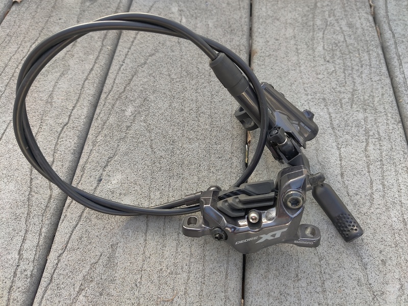 Shimano XT M8120 metalen remklauw met 4 zuigers Shimano XT M8120 metalen remklauw met 4 zuigers
