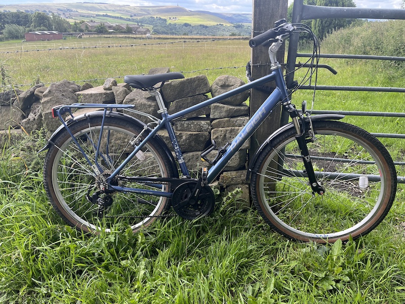 raleigh voyager trail hybrid bike