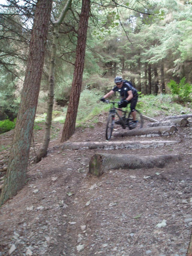Marc Fox on his bike, on a corner of the Glentress red!!