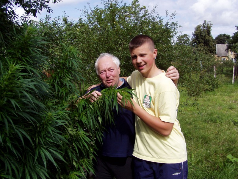 in my grandads garden with Canabis plants..... hheeh gangster picture :D