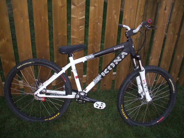 08 Kona Shred Medium Size
Frame-Black and White
Fork-Marzocchi DJ 3
Pedals-DMR V8 
Chainring-Blackspire Mono 
Handle Bar-Spank Lounge Riser
Grips-Lizard Skins Peaty
Brakes-Hayes MX4
Tires-Maxxis
Saddle-Kona DJ