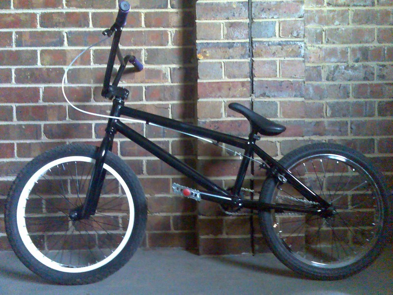 my 2009 kink transition, with new forks and front rim, and new pedals and grips. my friend has a 2009 kink transition but doesnt ride it any more so i bought the forks and front rim of him for $150! my origanal forks and front rim were stuffed! it is also destickered!