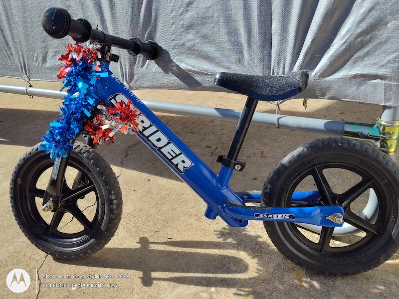 Strider balance bike online for sale