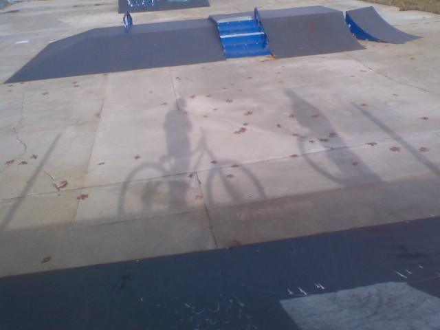 ben and i sitting ontop of the roll-in at the skate park