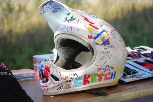 I sprayed my Troy Lee white, then myself and friend Shaun drew on it with pastels. Lacquered the bad boy up and it looks banging.