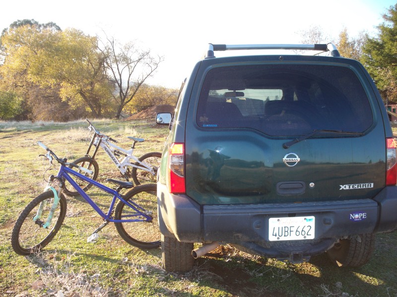 Family Photo! all three of my rides. My xterra, morewood, and black market