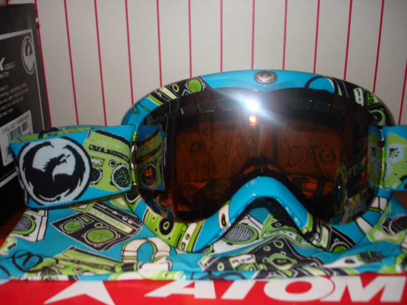 Dragon DX Skullcandy Co-oP Goggles with Ionized Lense and Matching Skullcandy Headphones and Bag