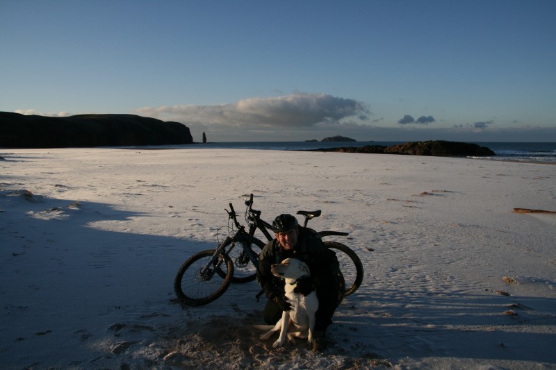 Neil &amp; Ifor (3 year old lab) on the beach at Sandwood bay in Sutherland. The sand is especially white as the whole place was frozen solid.