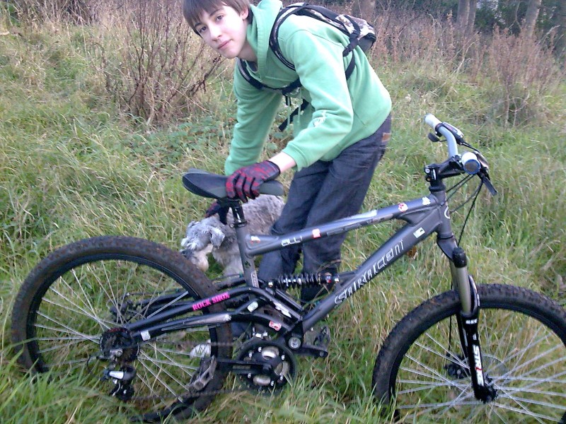 Paúl with his bike and my dog