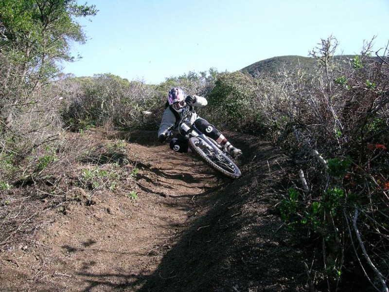 Railing the Poison Oak berm on Cave.  The oak on the outside of the turn is good motivation not to overshoot it.