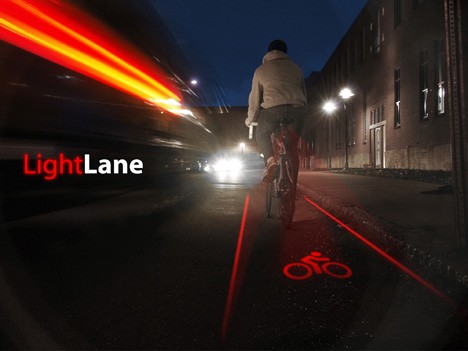 Light Lane is projected from the bike, behind the bike.
Story here
http://radek.pinkbike.com/blog/lightlane.html