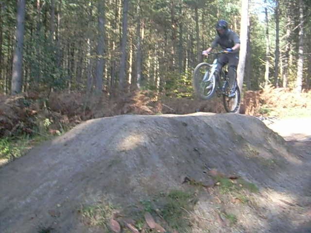 over the big table-top at the bedgebury downhill course