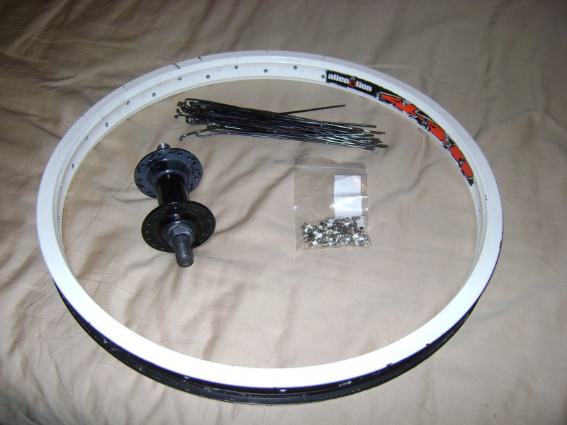 My old front wheel, i took off all the spokes, im going to lace this great rim with my eastern cassette..