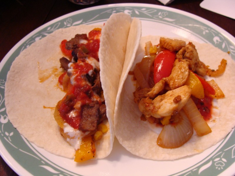 Chicken and Beef fajitas for supper:d Yum. Mixed in with sauteed onions, corn and peppers.