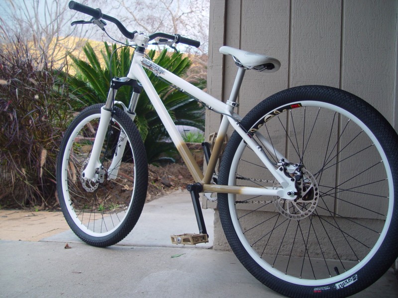 Just a pic of my Haro Steel Reserve 1 with some SNAFU kit.  Mayweather cranks, concave pedals, seat and chromoly MTB bars.  Also have SNAFU Rim Job rear and Knob Job front 26" tires.  It had mechanical rear caliper but I love my front brakes so I put Avid Juicy front/rear.