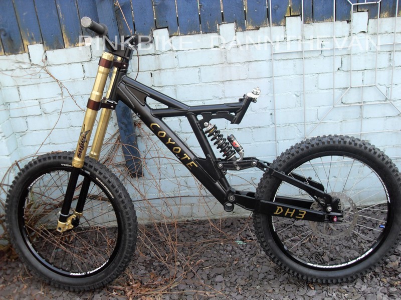 my coyote dh3 project. blackened frame, shock to be replaced with a black/gold manitou swinger 4way. Wheels are currently being ordered/built. these are temporary. 

some temporary stickers to get a visual on future intentions. Solid lettering or hollowed out / pin stripe!?