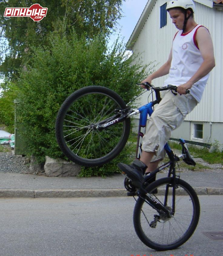 Me looking really strange while im doing a wheelie...