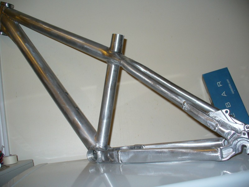 STP frame rawed + cut/filed/ sanded cable guides and v brake mounts = 1929g or 4.25lb with headset cups.