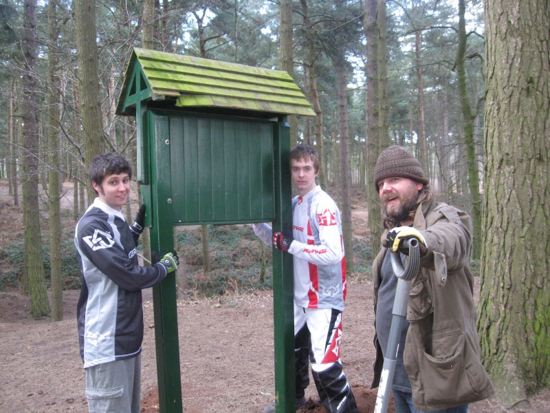 danny and joe looking worried as the forest hobo gets in the shot