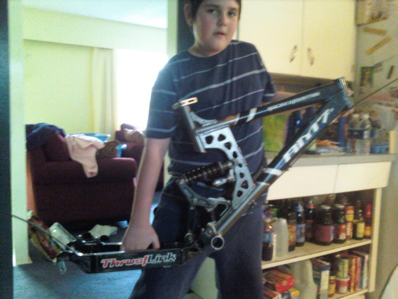 my bro holding my new (to me) RM7 frame