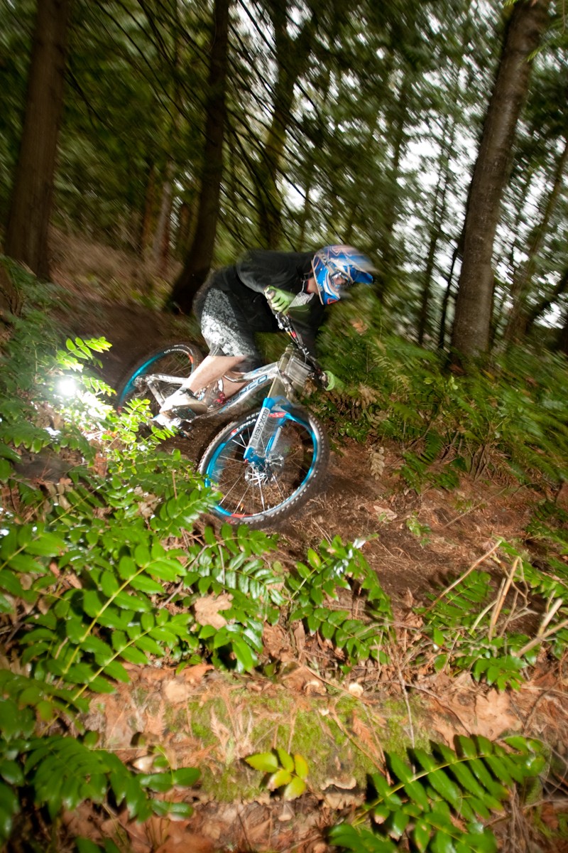 Eric Ripping it up on his new Norco Team DH, while i practice taking shots with external flash's.
Thanks for hiking so many times buddy!