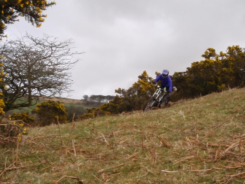 Me (rotec/fox 40's) Matt (DH team/888) Rob (223/boxxer) Tom (nicolai/40's)
Dartmoor special at its best...Drifty!  This is the top sections. More to come.