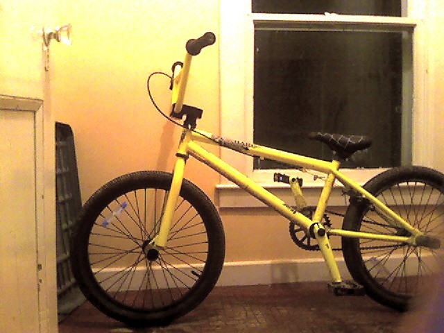 my bike. It's a haro X2 neon yellow, i took a pic with the webcam hah, talk about top quality photography!