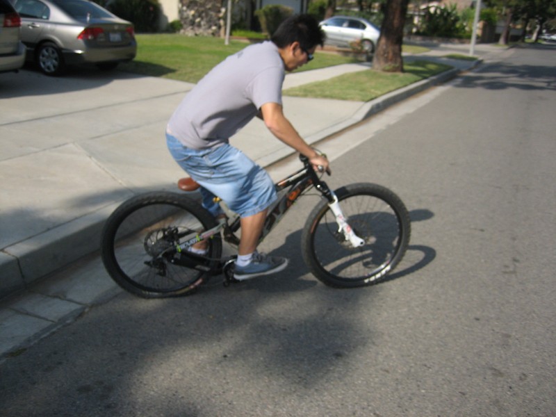 bottom out sesh. this is my friend. i know we dont have helmets on because it was just a curb and my house is on the left