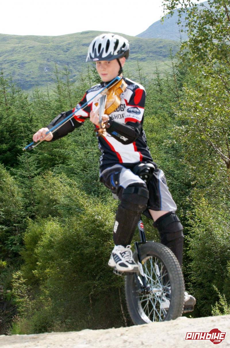 im riding at the bottom of ben nevis in scotland just for some shots before going down the world cup down hill race track on the mountian on my muni
