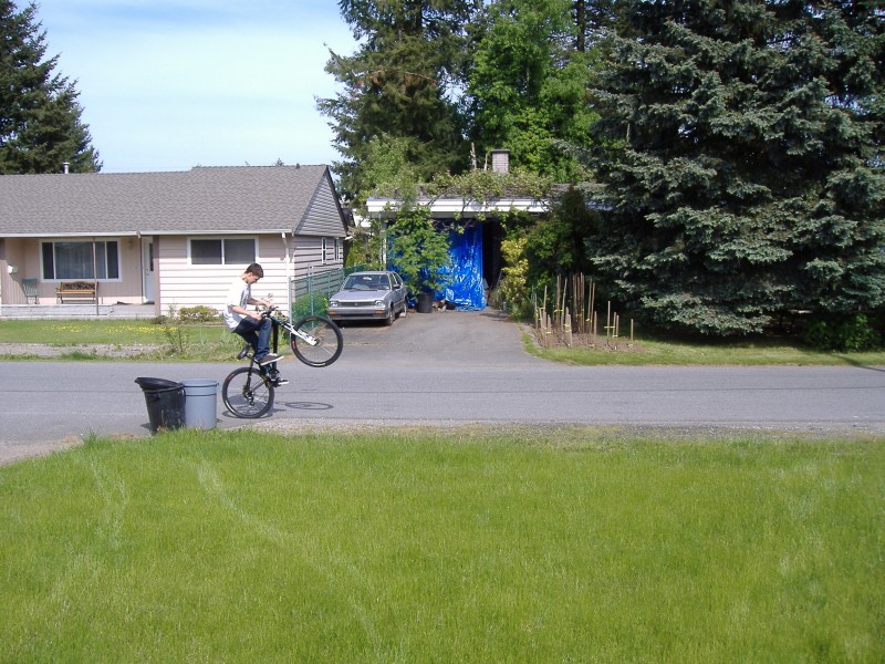 practicing wheelies i still kinda suck but this was the best one i did and it was the longest