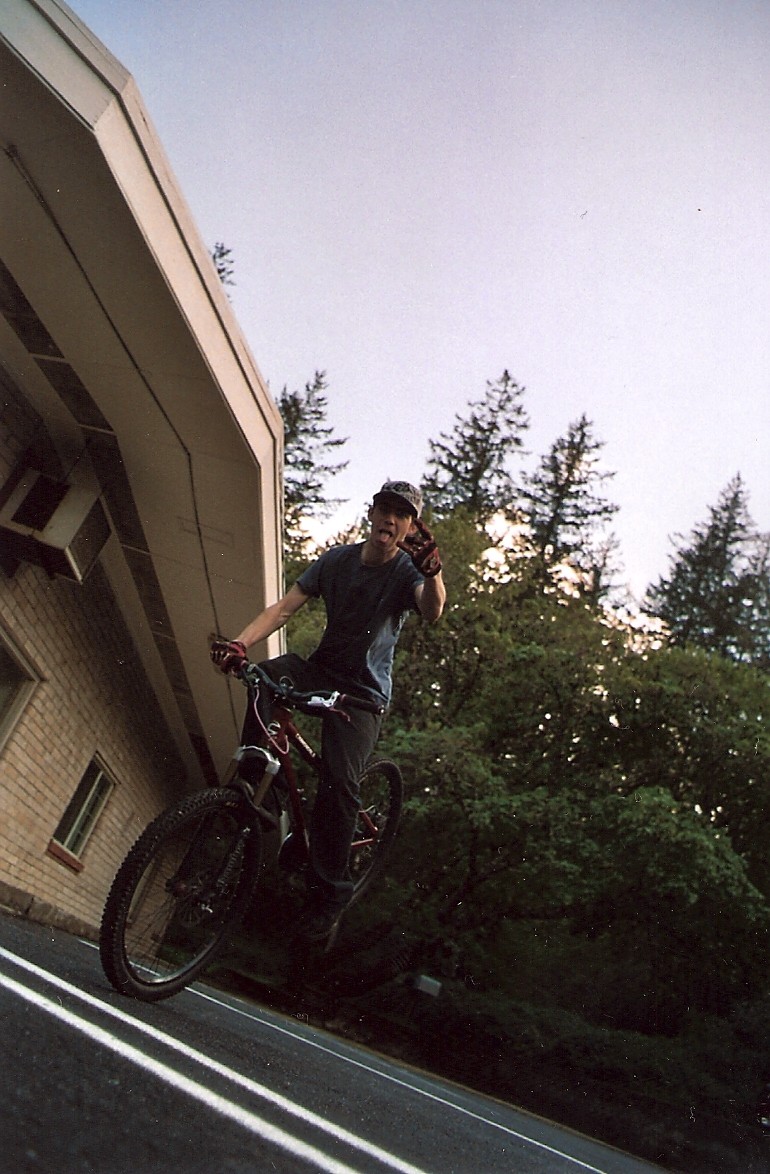 rock on stoppie. haha.  this is my bro. i snapped this with my film camera